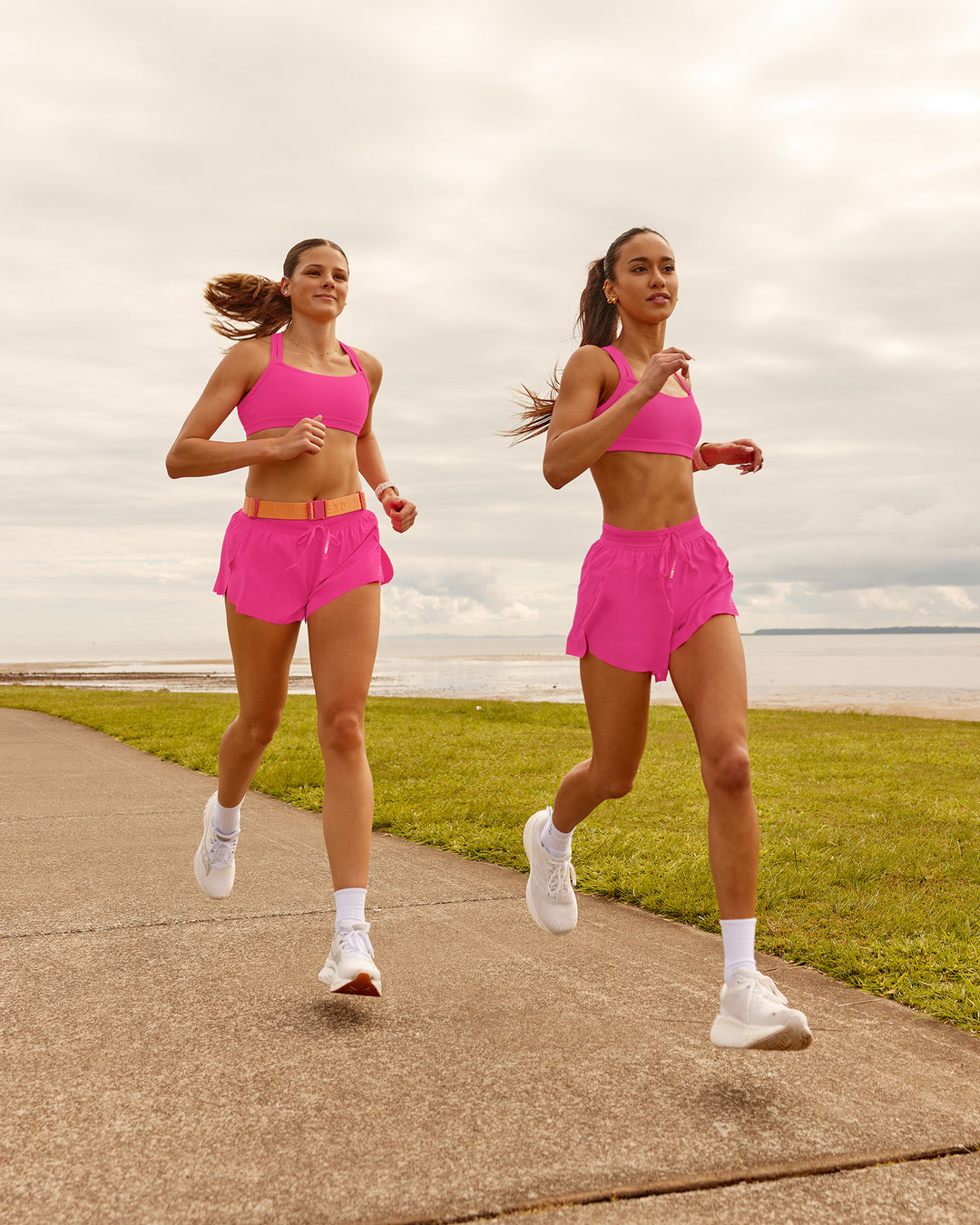 Woman wearing Accelerate 3" Running Short - Ultra Pink | Model:Duo | Size:Both