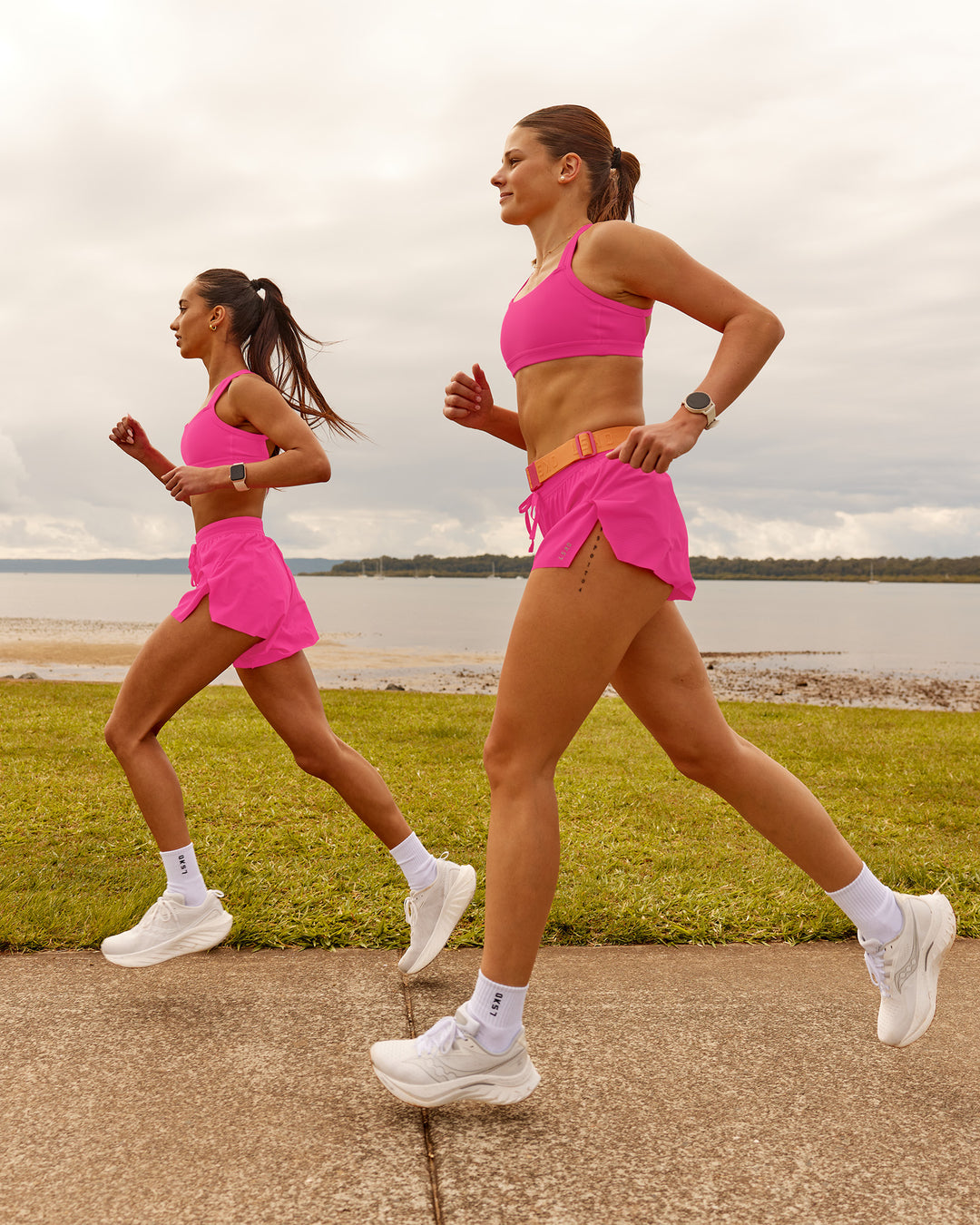 Woman wearing Accelerate 3" Running Short - Ultra Pink | Model:Duo | Size:Both
