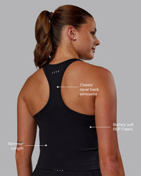 Woman wearing Flow Performance Tank - Black | Model:Phoebe | Size:S