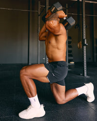 Man wearing Hybrid 5" Short - Black-Reflective | Model:Xav | Size:L