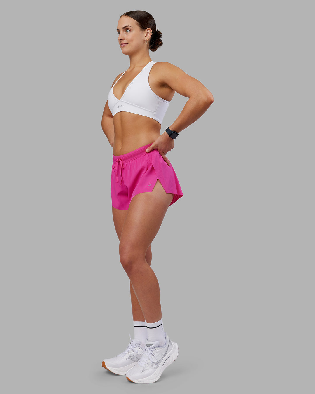 Woman wearing Accelerate 3" Running Short - Ultra Pink | Model:Keisha | Size:S