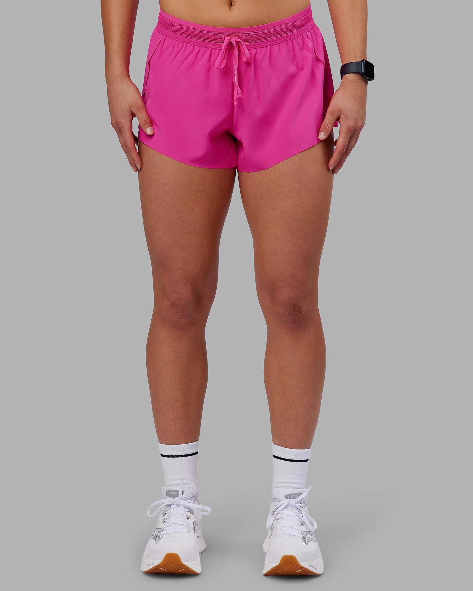 Woman wearing Accelerate 3" Running Short - Ultra Pink | Set:true | Angle:front | Model:Keisha | Size:S