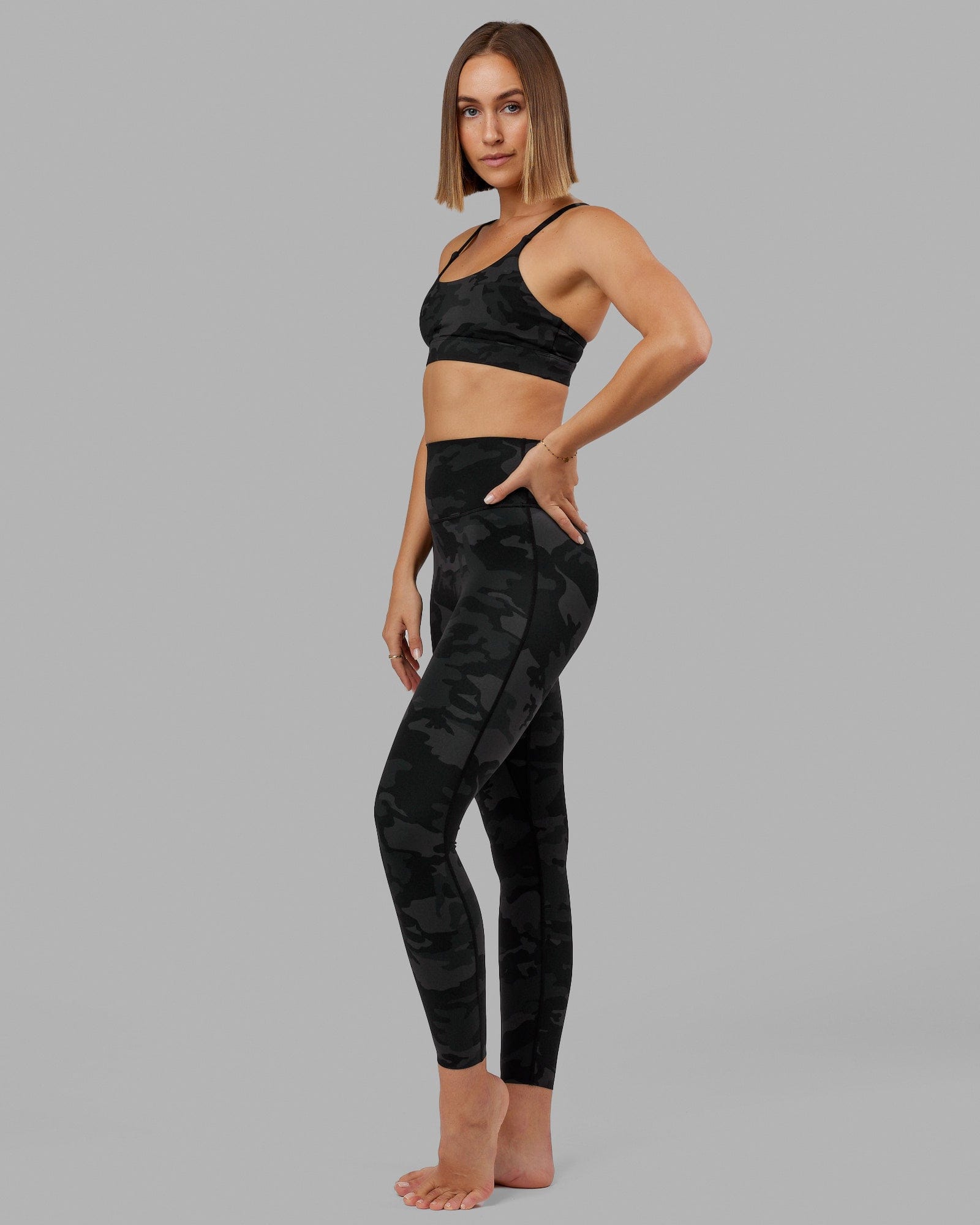 Woman wearing Elixir Ultra High-Rise Full Length Legging - Black Camo