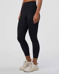 Woman wearing Fusion Ultra High-Rise 7/8 Legging Pockets - Black | Model:Amity | Size:S
