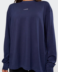 Woman wearing Go-To Long Sleeve FLXCotton Oversized Tee - Future Navy-White | Model:Bianca | Size:S