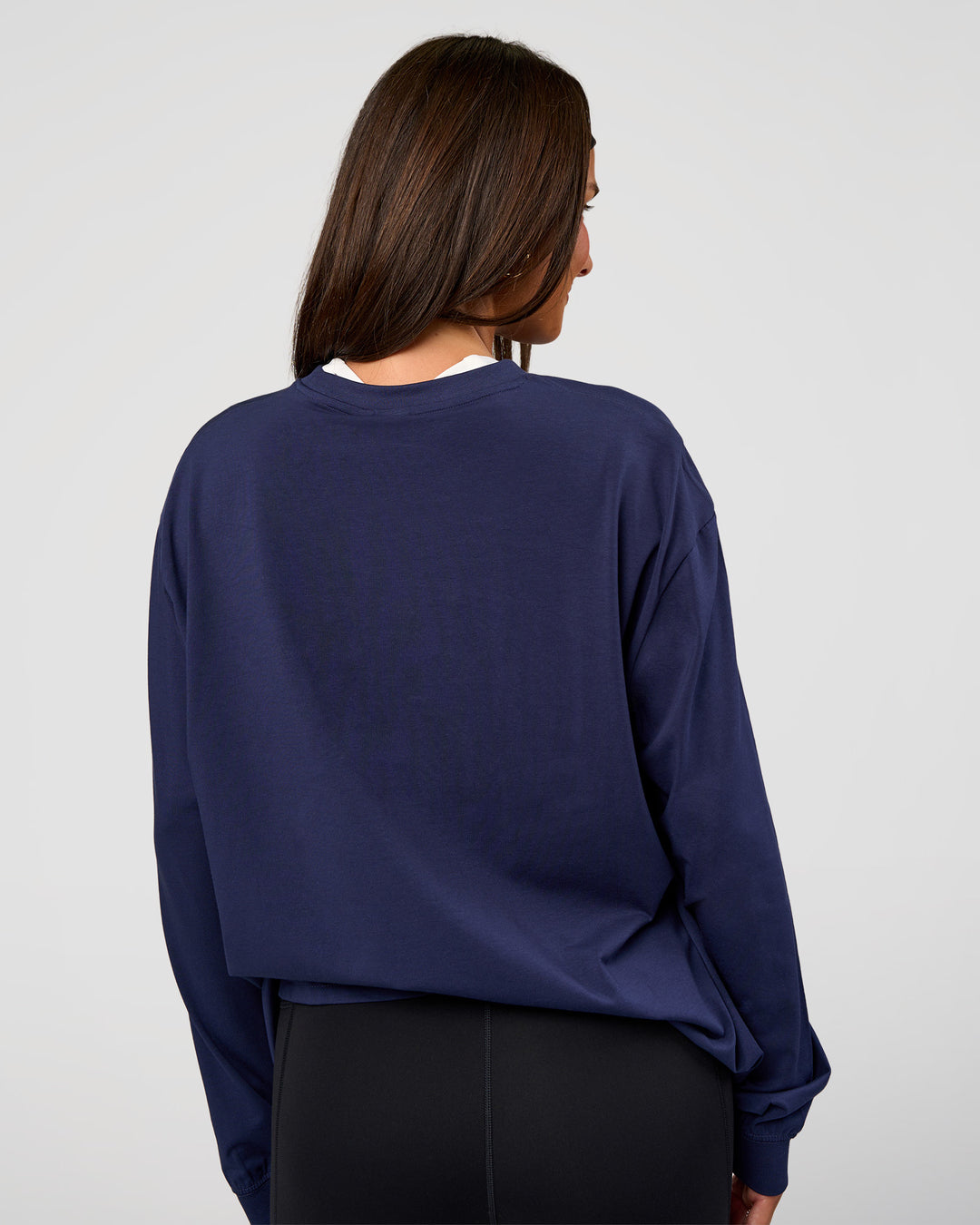 Woman wearing Go-To Long Sleeve FLXCotton Oversized Tee - Future Navy-White | Model:Bianca | Size:S