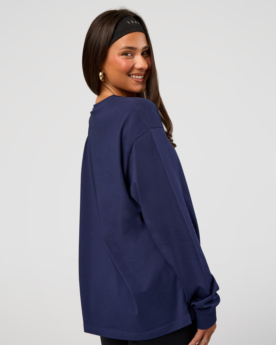 Woman wearing Go-To Long Sleeve FLXCotton Oversized Tee - Future Navy-White | Model:Bianca | Size:S