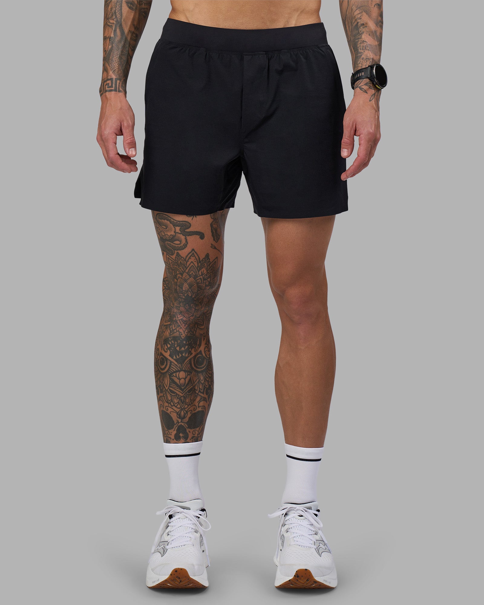 Man wearing Hybrid 5" Short - Black-Reflective | Model:Tommy | Size:S