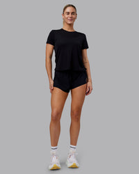 Woman wearing Pace Running Tee - Black | Model:Hannah | Size:S
